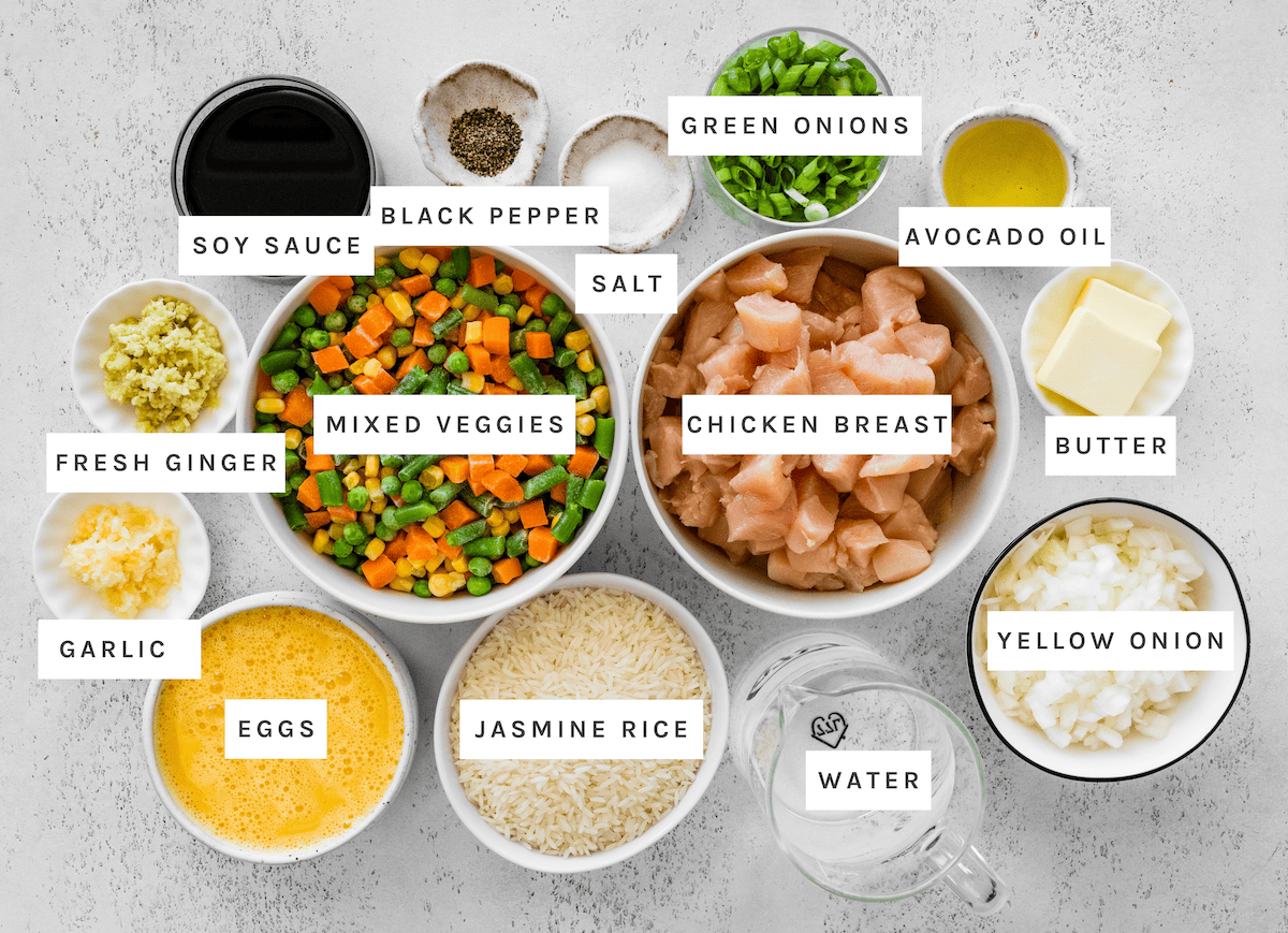 Chicken breast, jasmine rice, mixed veggies, eggs, yellow onion, green onions, fresh ginger, garlic, soy sauce, avocado oil, butter, salt, black pepper, water