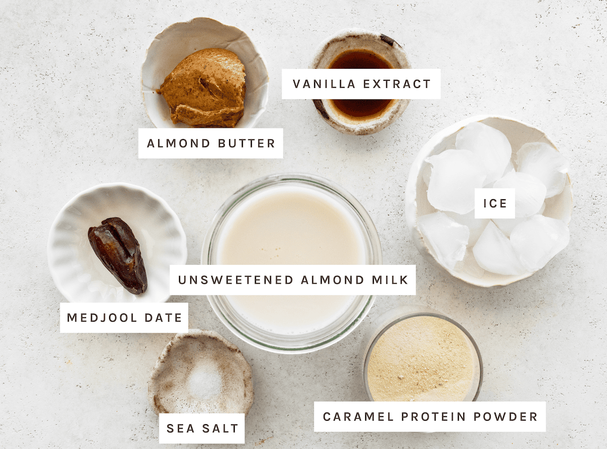 Almond butter, vanilla extract, ice, unsweetened almond milk, Medjool date, sea salt, caramel protein powder