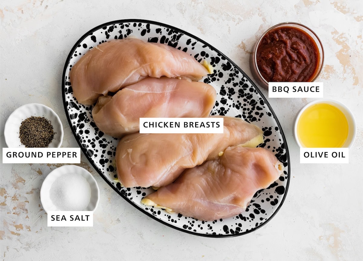 Grilled BBQ Chicken Breasts ingredients: Chicken breasts, BBQ sauce, olive oil, sea salt, ground pepper.