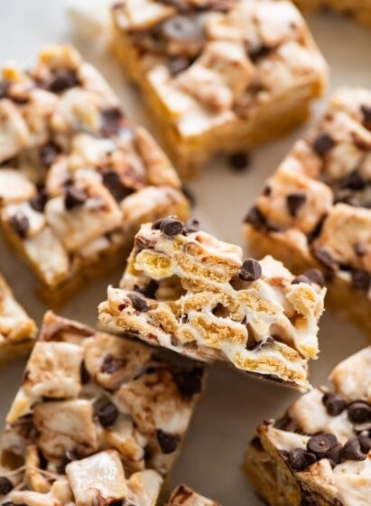 High protein s'mores treats near one another on parchment paper.