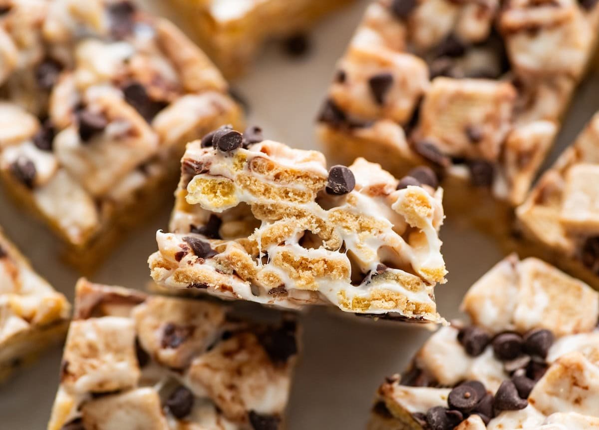 High protein s'mores treats near one another on parchment paper.