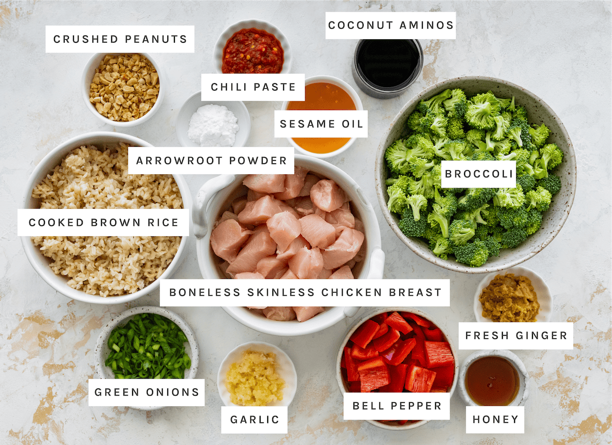 Crushed peanuts, chili paste, coconut aminos, sesame oil, arrowroot powder, cooked brown rice, boneless skinless chicken breast, broccoli, green onions, garlic, bell pepper, fresh ginger, honey