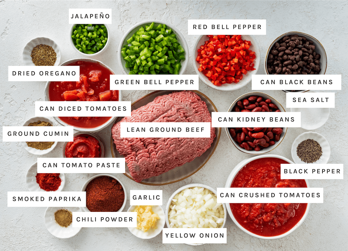 Jalape&ntilde;o, green bell pepper, red bell pepper, yellow onion, garlic, lean ground beef, canned diced tomatoes, canned crushed tomatoes, canned tomato paste, canned black beans, canned kidney beans, chili powder, ground cumin, smoked paprika, dried oregano, sea salt, black pepper