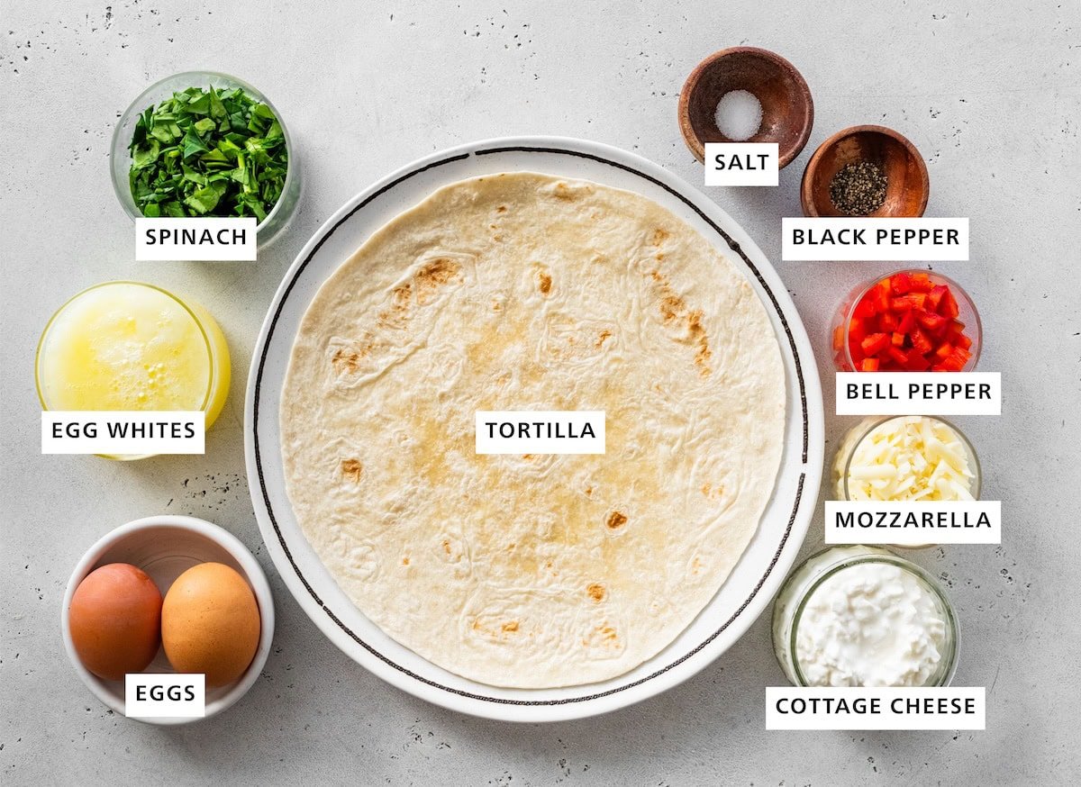 Ingredients for the tortilla quiche: tortilla, eggs, egg whites, spinach, cottage cheese, mozzarella, red bell pepper, black pepper and salt.