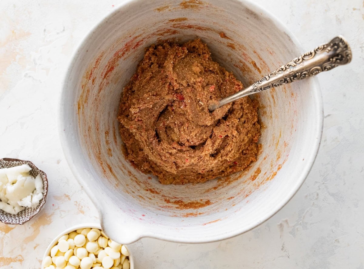 Mixing bowl with the dough for strawberry protein balls.