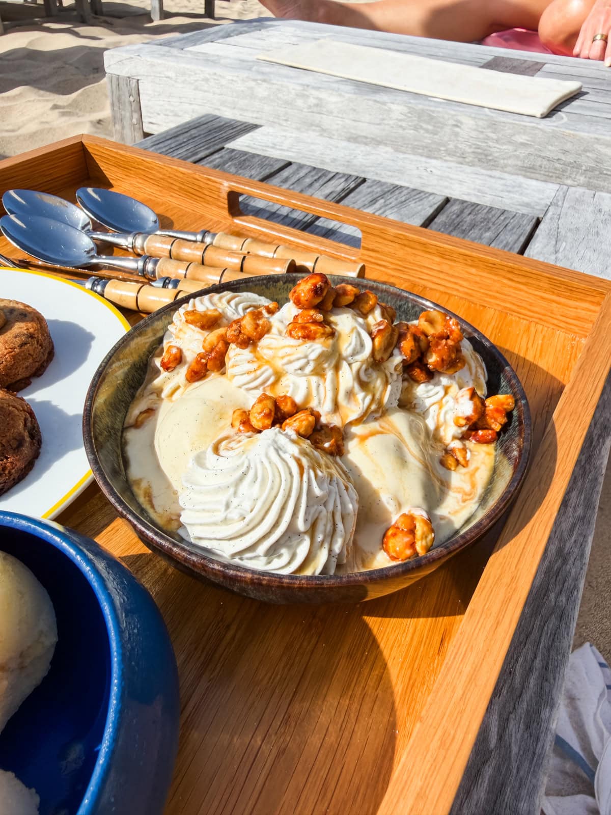 Cheval Blanc dessert bowl with whipped cream and caramelized nuts