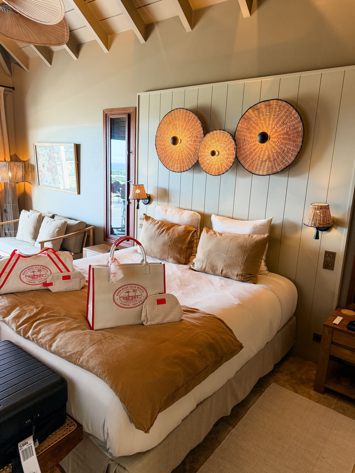 Eden Rock Villa Bonnie bedroom with Eden Rock branded welcome bags