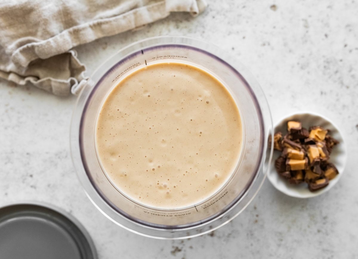 A peanut butter cup blizzard mixture in a pint container before being frozen.