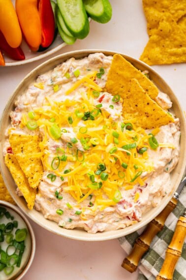A cottage cheese boat dip in a bowl with tortilla chips to the side.