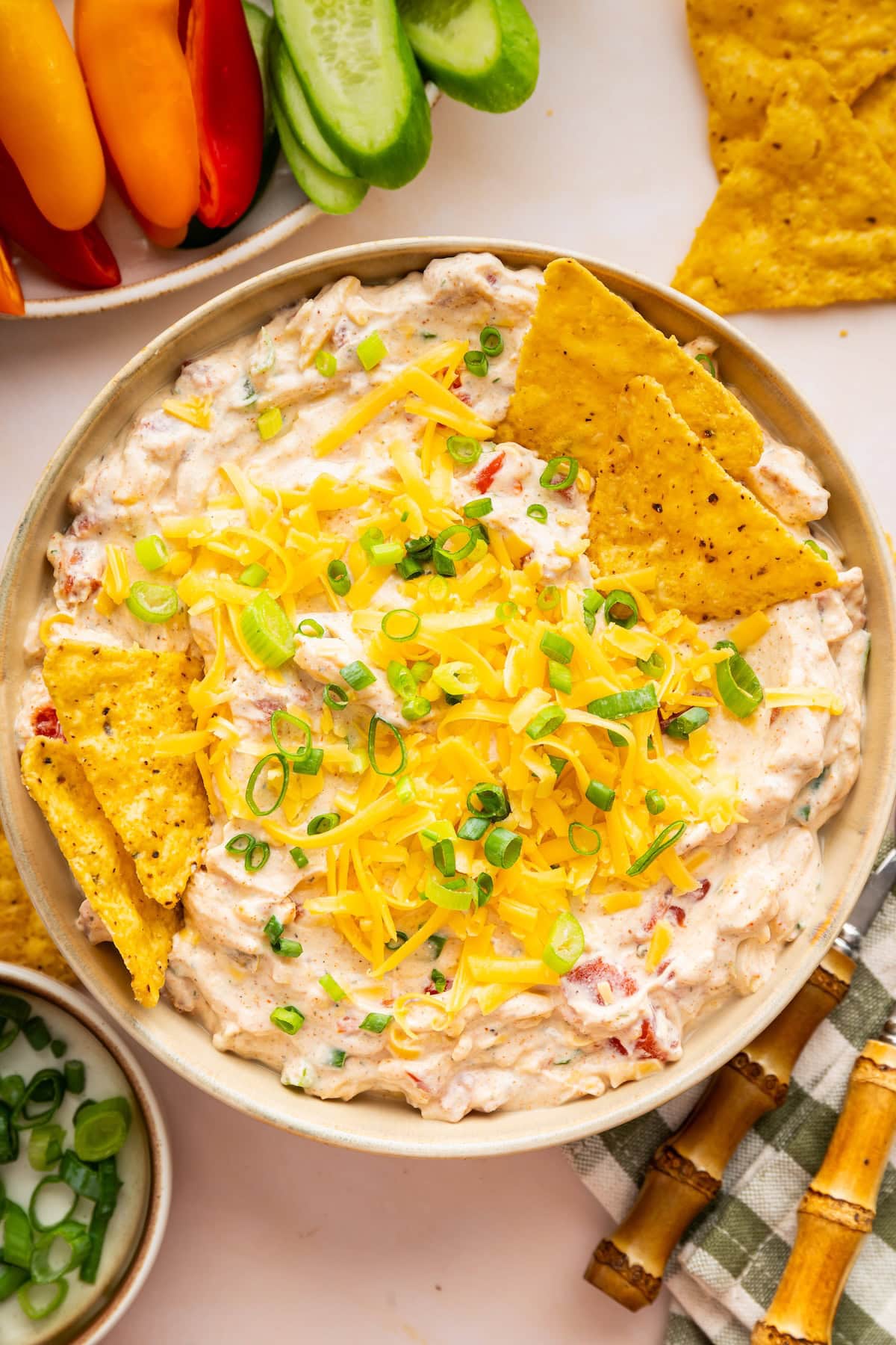 A cottage cheese boat dip in a bowl with tortilla chips to the side.