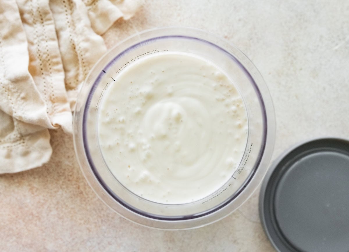 Greek yogurt ice cream mixed together in the Ninja Creami before freezing.
